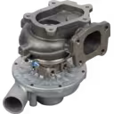 Isuzu 4HE1 turbocharger bottom view showing radial fin casting details on compressor base